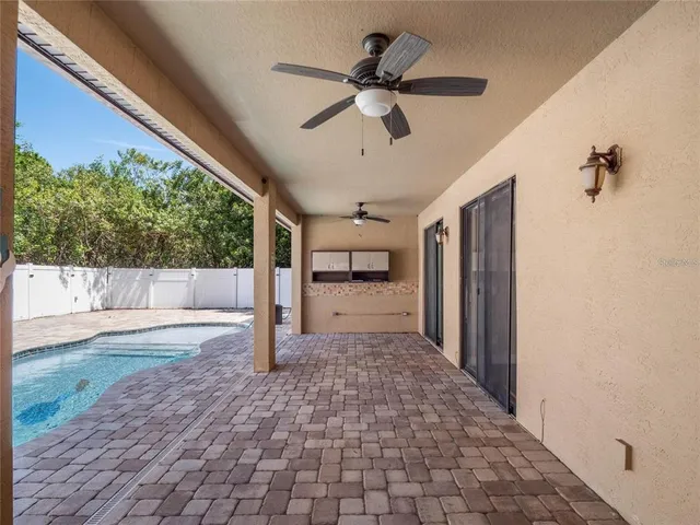 a view of a hallway with a chandelier