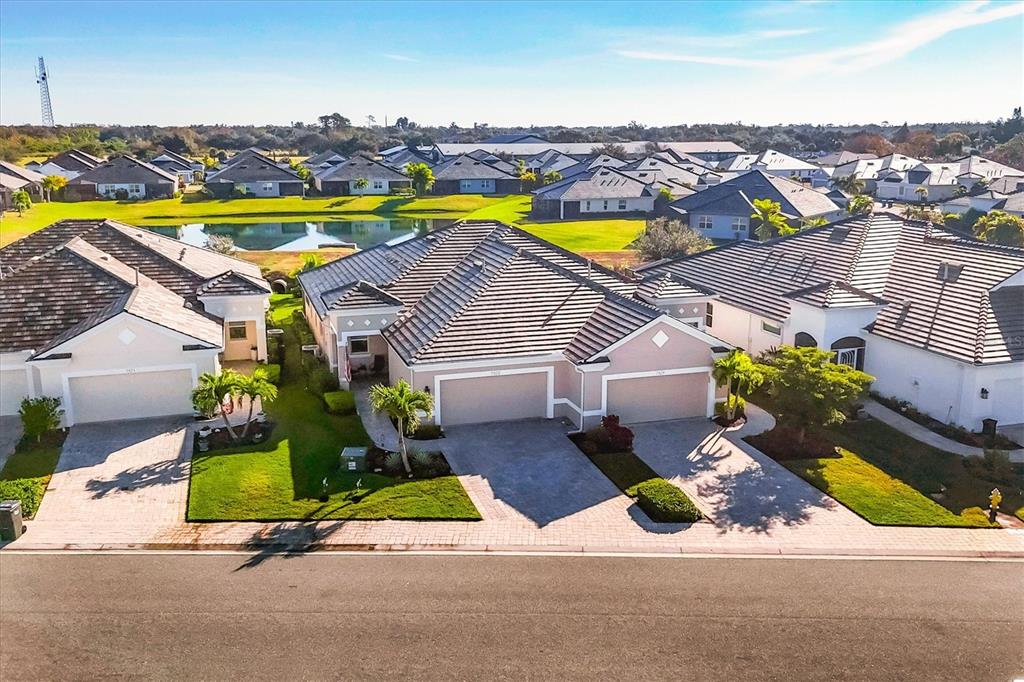 an aerial view of a house with swimming pool
