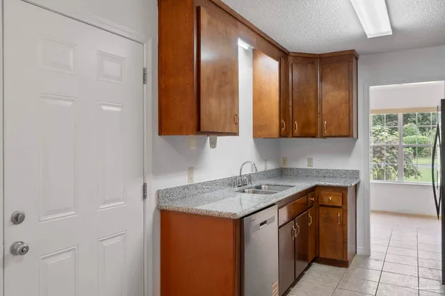 a utility room with cabinets