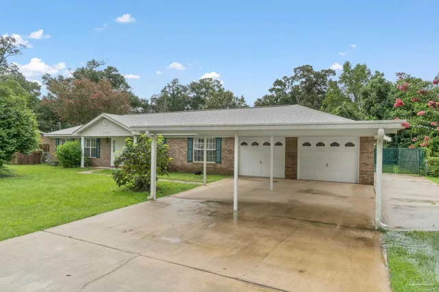 a view of house with outdoor space and porch