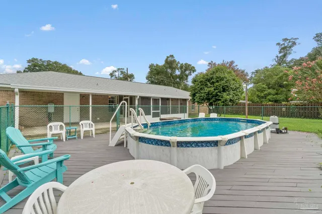 a view of a house with a swimming pool