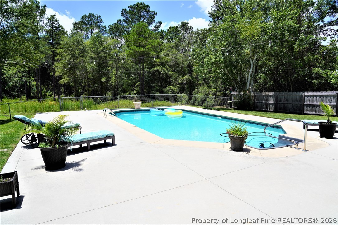930 Old Vander Road Fayetteville, NC 28312 - Photo 40 of 45 a view of a swimming pool with furniture