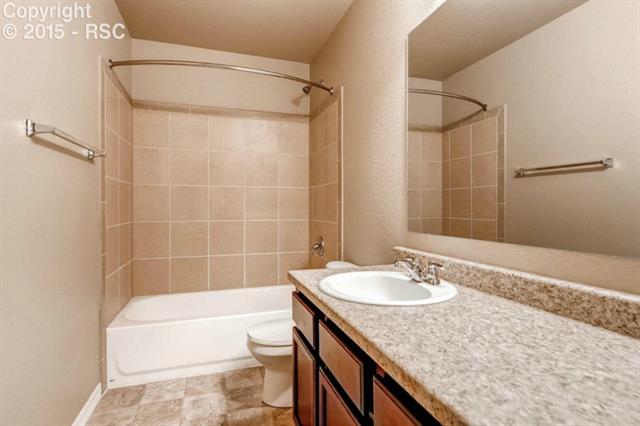 944 Diamond Rim Drive Colorado Springs, CO 80921 - Photo 23 of 28 Upper level full bath conveniently located between bedrooms.
