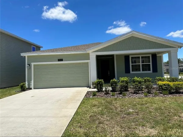 a front view of house with yard