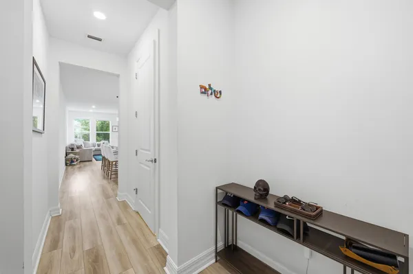 a view of a hallway with closet