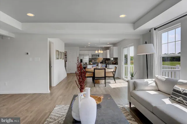 a living room with furniture and a table