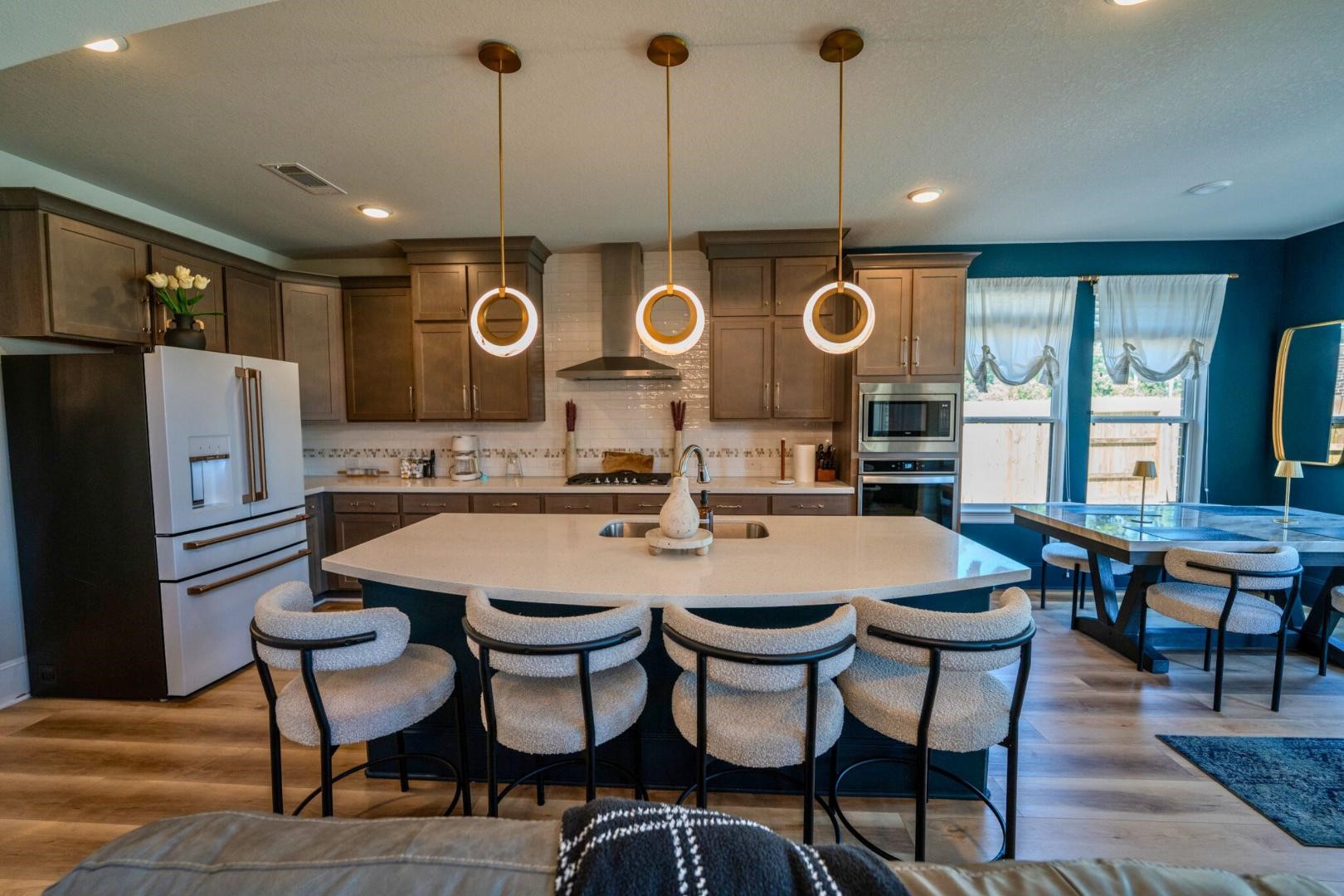 11347 Needlerock Court Humble, TX 77396 - Photo 7 of 20 a large kitchen with a table and chairs