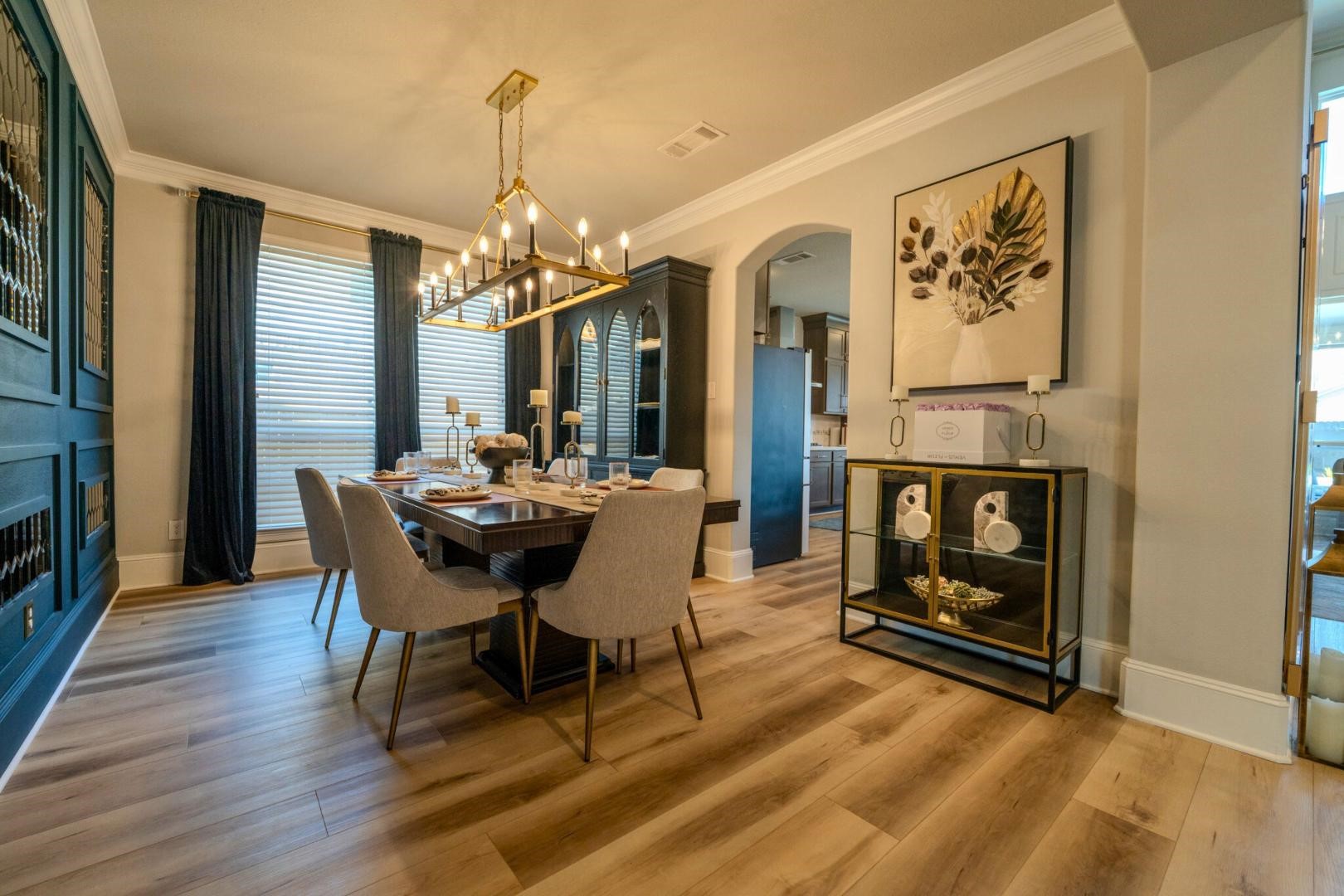 11347 Needlerock Court Humble, TX 77396 - Photo 10 of 20 a view of a dining room with furniture window and wooden floor