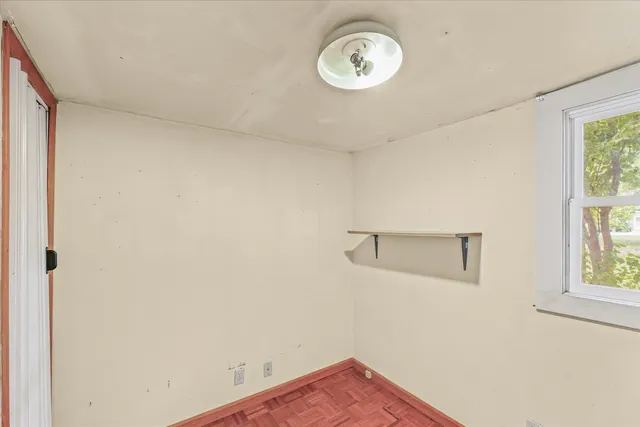 a view of a room with a window