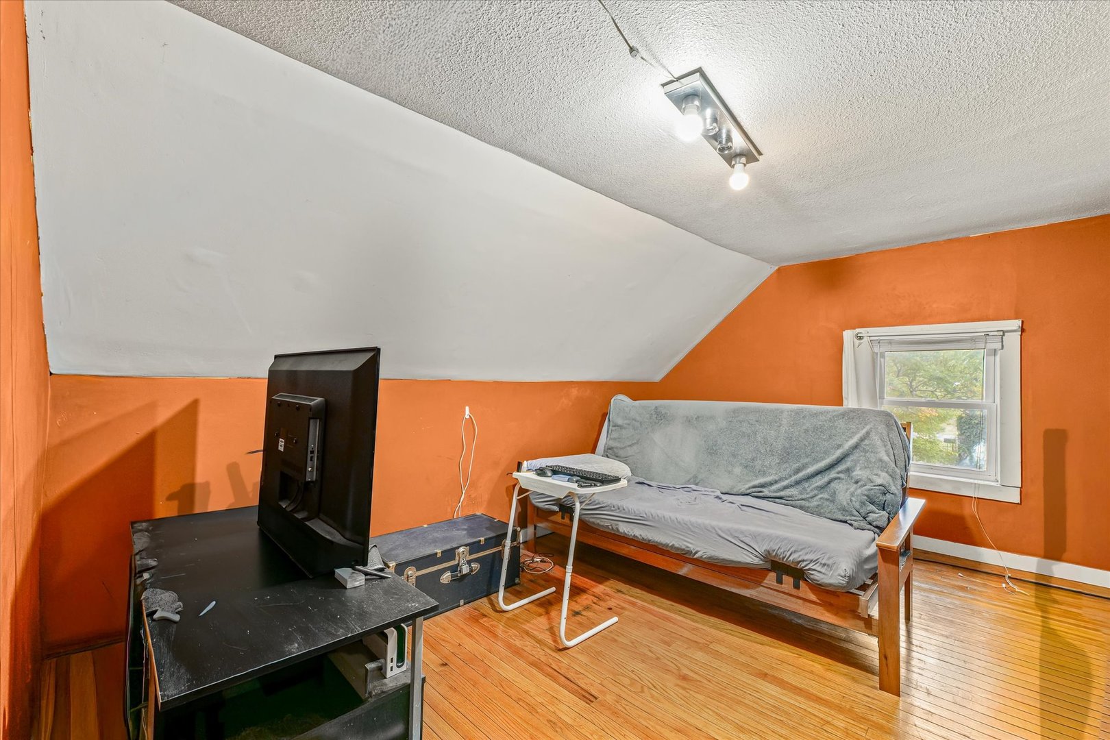 204 Waverly Street Homer, IL 61849 - Photo 24 of 30 a living room with furniture and a flat screen tv