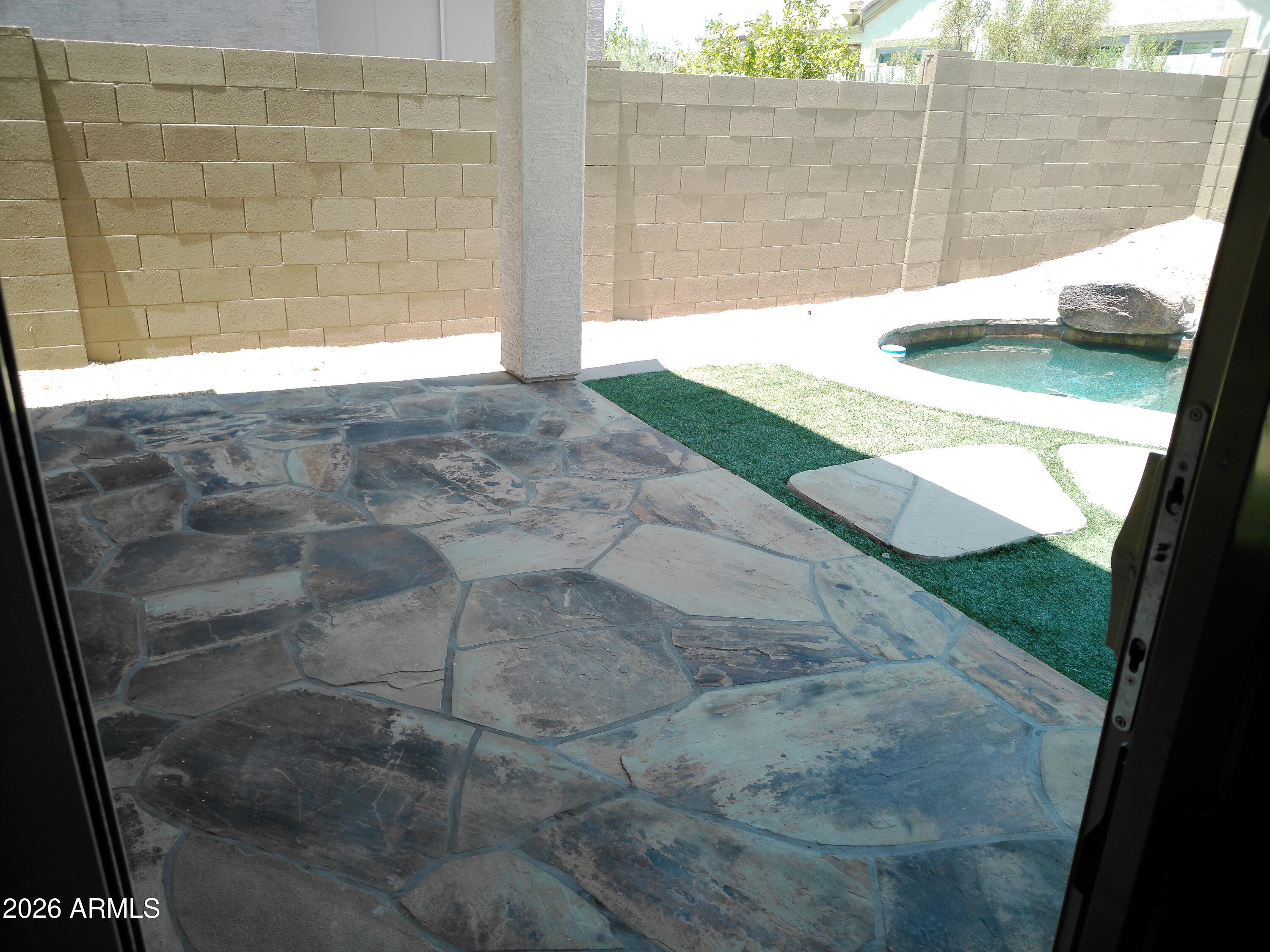 3018 West Sentinel Rock Road Phoenix, AZ 85086 - Photo 9 of 16 a backyard of a house