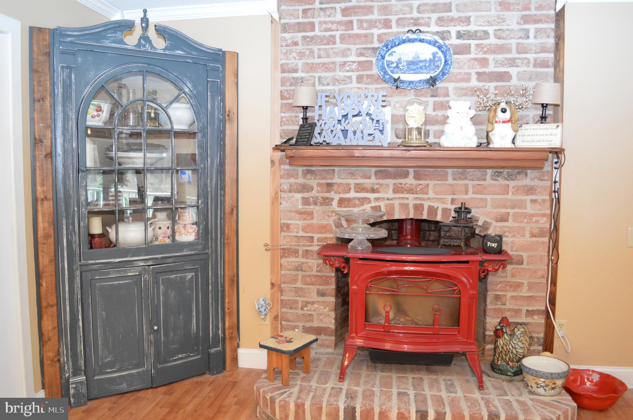 7424 Cherry Walk Road Hebron, MD 21830 - Photo 24 of 59 Brick Fireplace with Gas Insert & Built-in Hutch