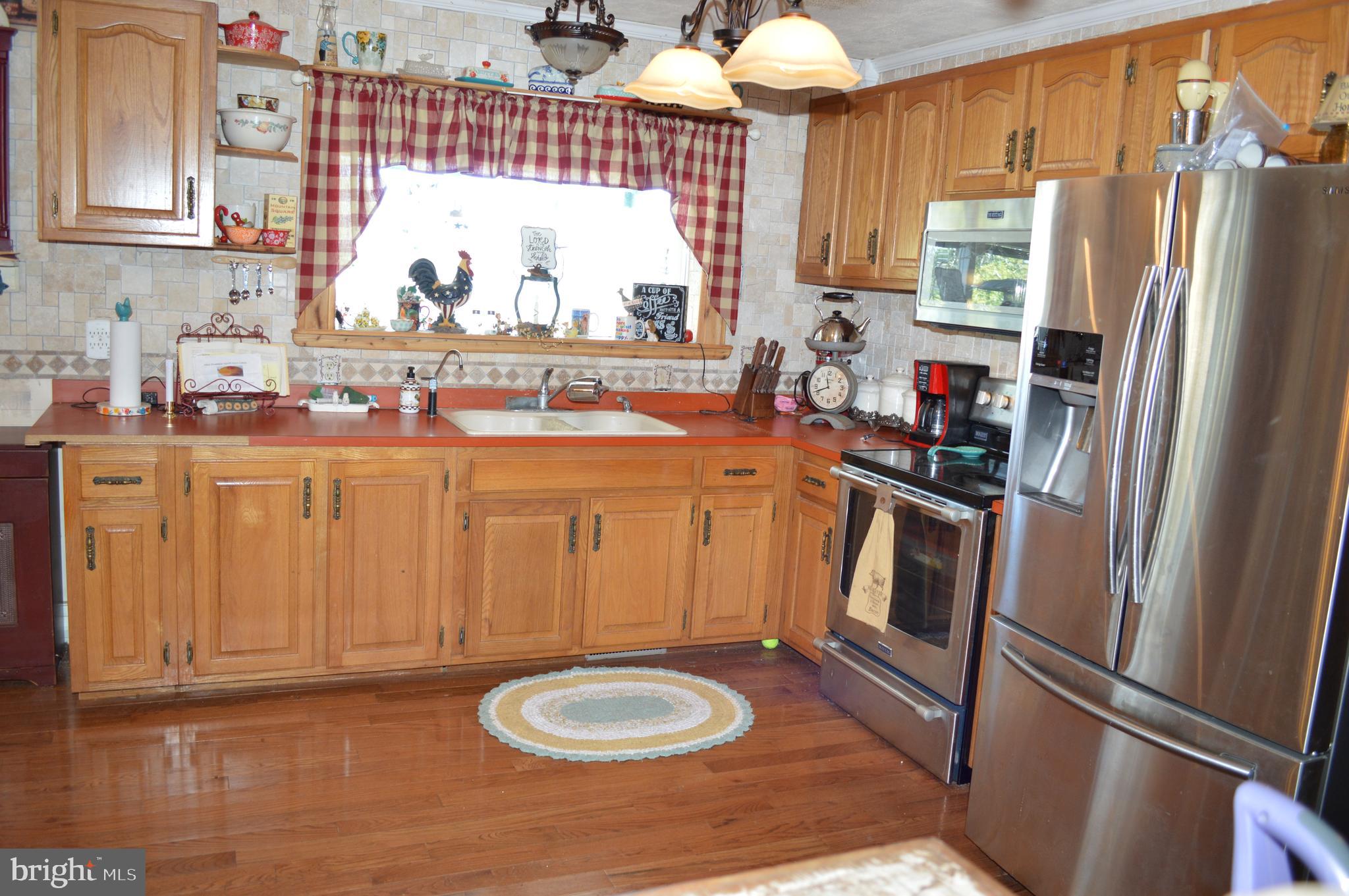 7424 Cherry Walk Road Hebron, MD 21830 - Photo 25 of 59 Kitchen With Picture Window Overlooking Water