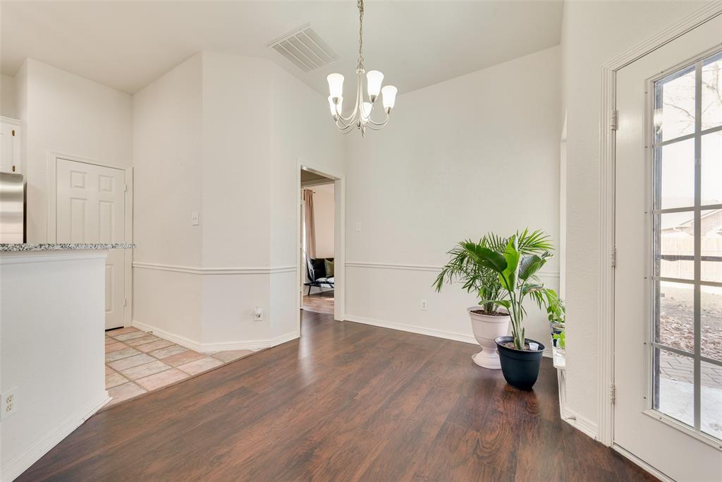 106 Villanova Circle Forney, TX 75126 - Photo 9 of 26 a view of a room with wooden floor