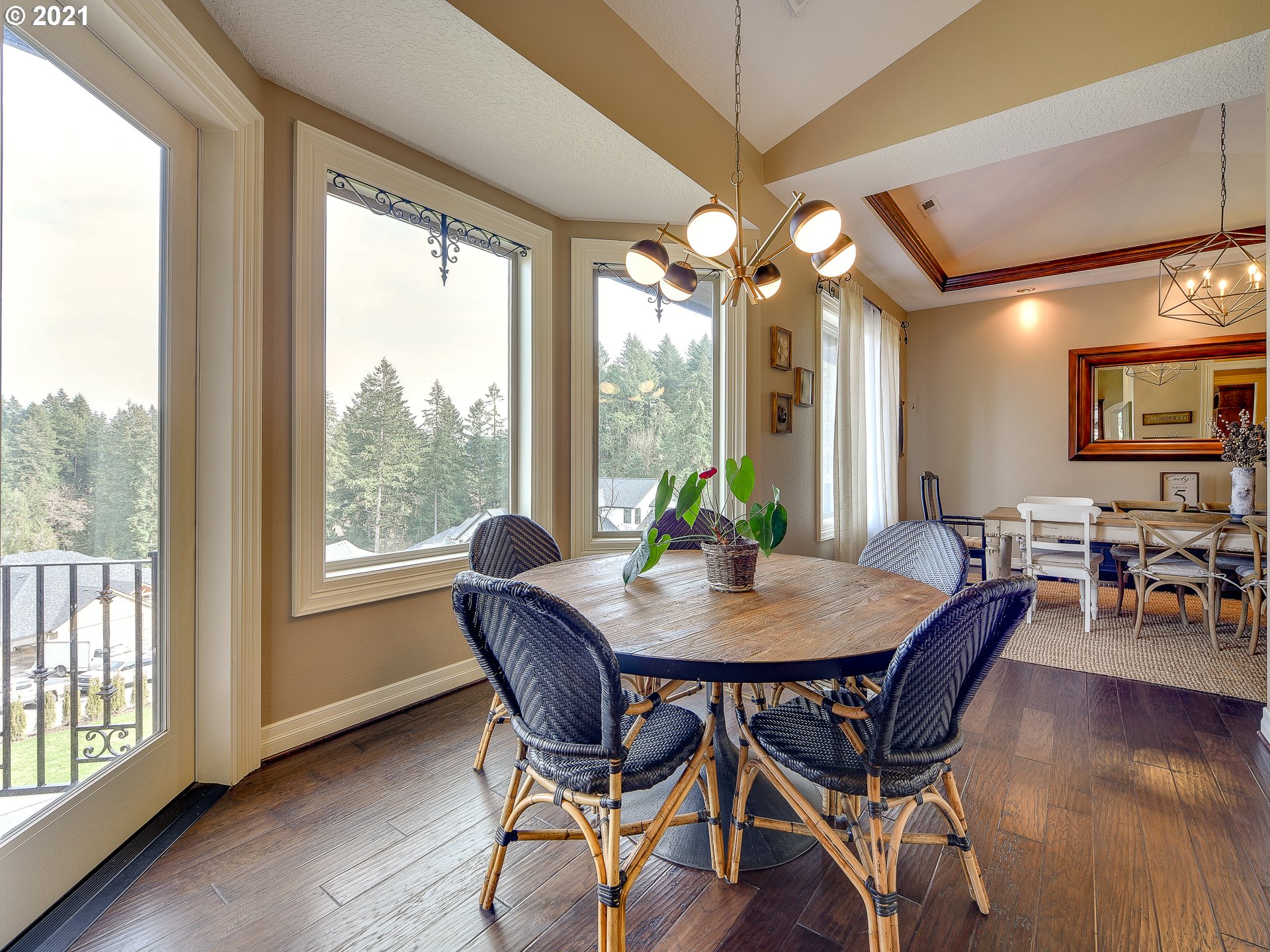 1711 South 8th Way Ridgefield, WA 98642 - Photo 11 of 28 a view of a dining room with furniture window and wooden floor