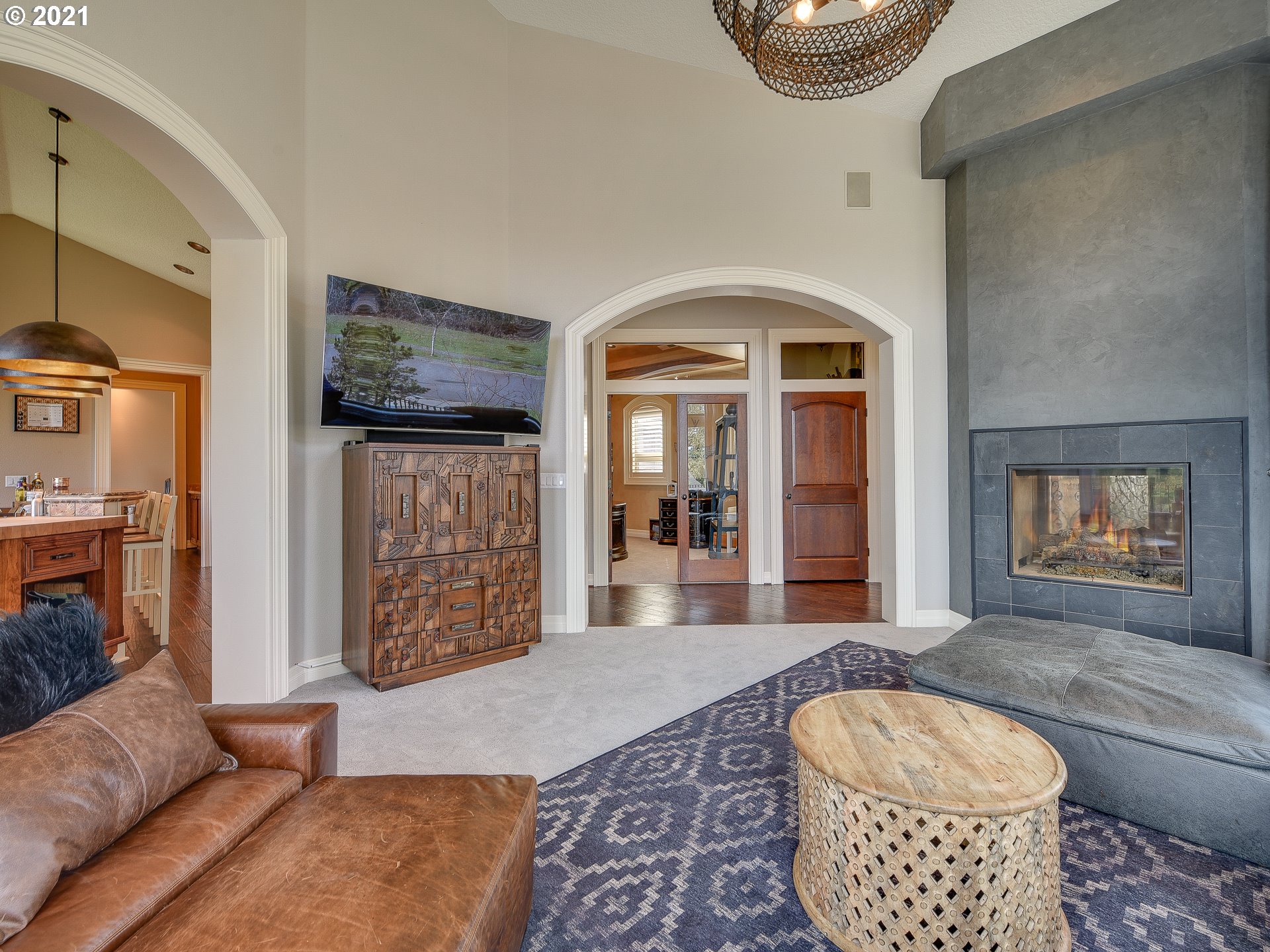 1711 South 8th Way Ridgefield, WA 98642 - Photo 6 of 28 a living room with furniture a rug and wall painting