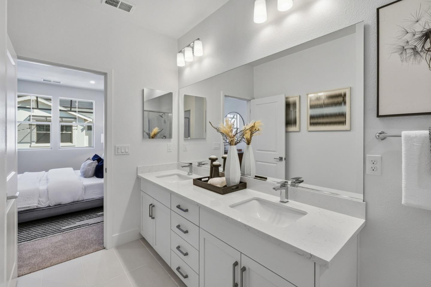 184 Oak Circle Walnut Creek, CA 94597 - Photo 15 of 24 a en suite bathroom with double vanity and a mirror