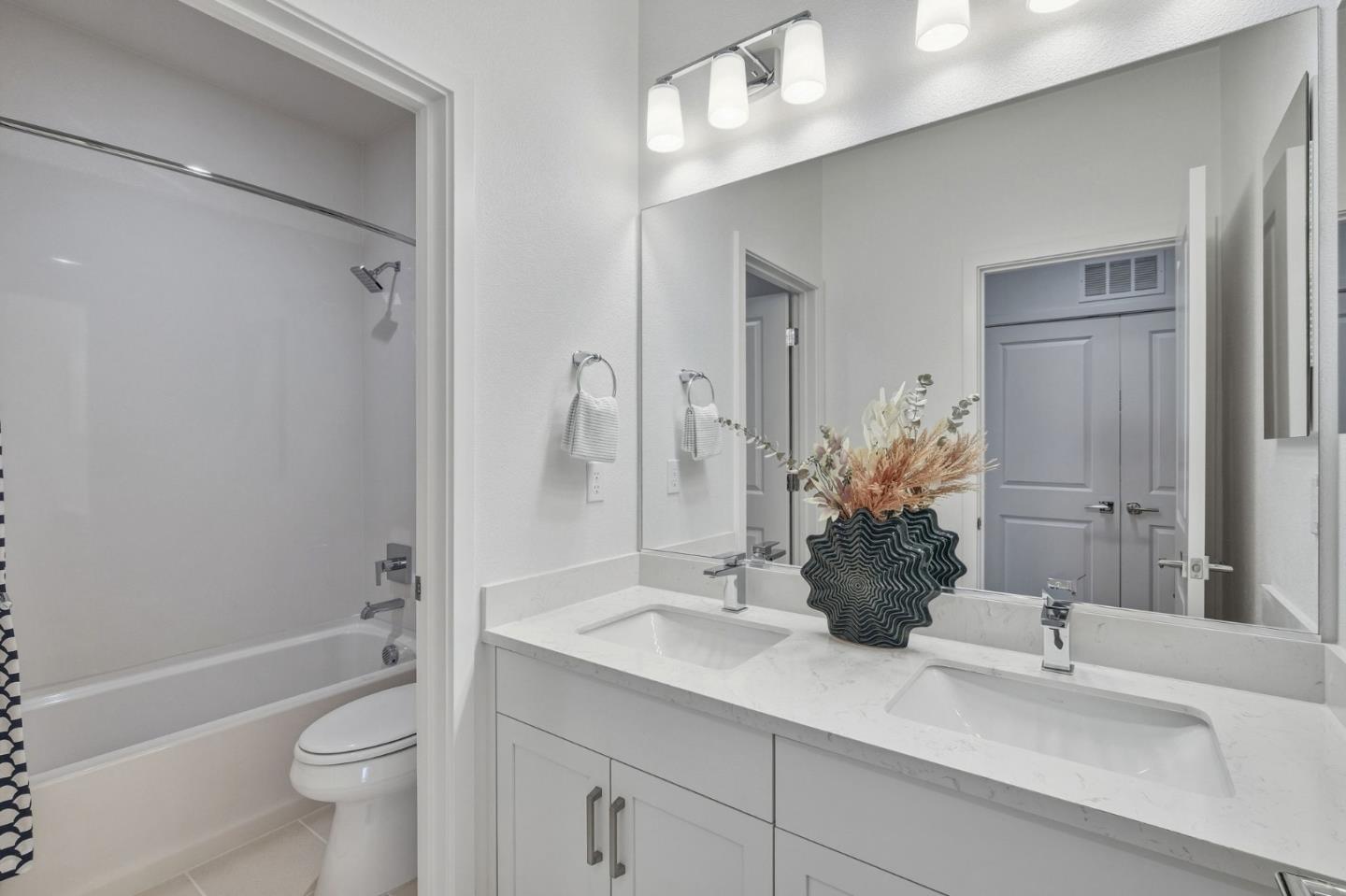 184 Oak Circle Walnut Creek, CA 94597 - Photo 18 of 24 a bathroom with a sink a toilet and shower