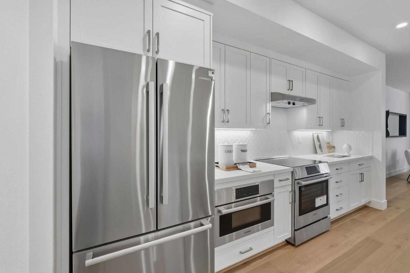 184 Oak Circle Walnut Creek, CA 94597 - Photo 10 of 24 a kitchen with stainless steel appliances a stove and a refrigerator