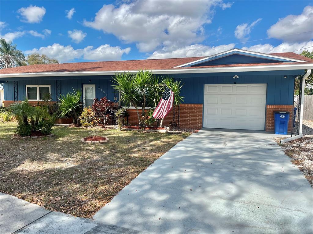 1935 Villa Rosa Drive Holiday, FL 34690 - Photo 1 of 1 a view of a house with backyard