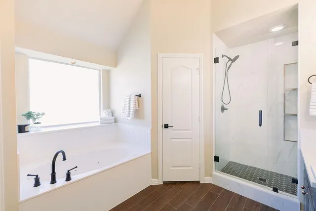 a bathroom with a sink and a shower