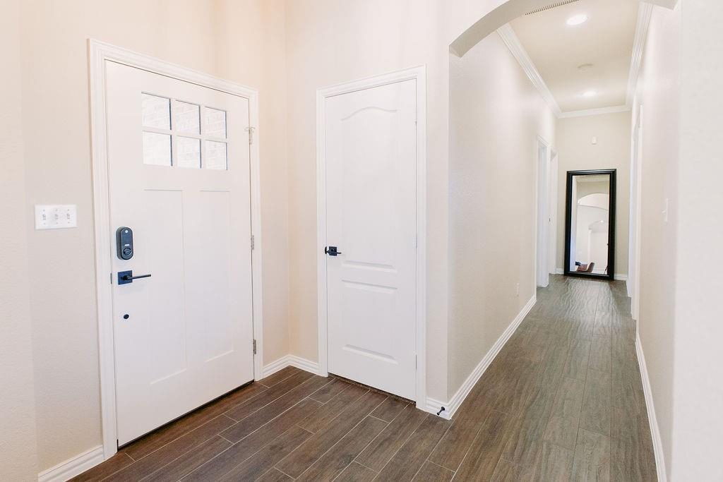 1377 Block Road Gunter, TX 75058 - Photo 4 of 37 a view of a hallway with wooden floor