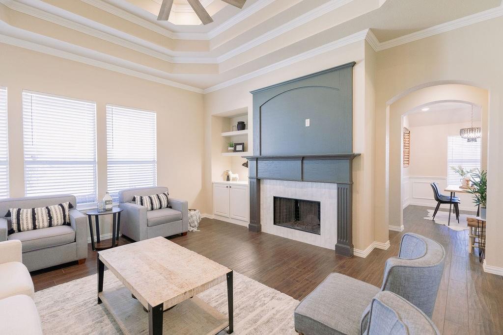 1377 Block Road Gunter, TX 75058 - Photo 7 of 37 a living room with furniture and a fireplace