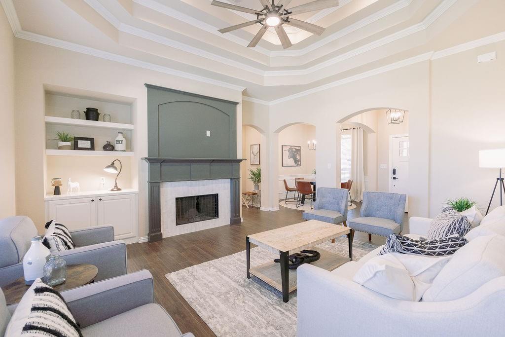 1377 Block Road Gunter, TX 75058 - Photo 8 of 37 a living room with furniture fireplace and a table