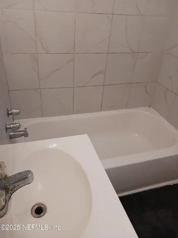 a bathroom with a tub
