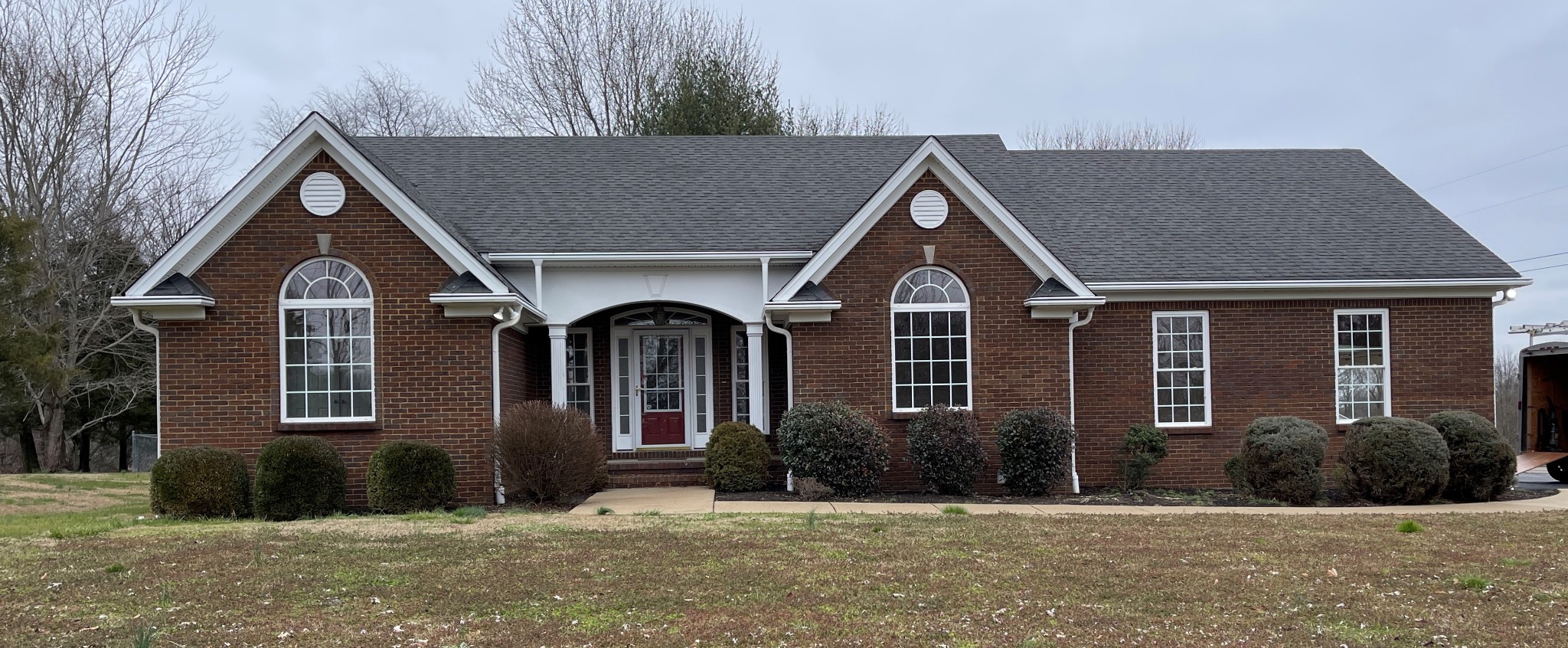 2136 Clara Mathis Road Spring Hill, TN 37174 - Photo 1 of 23 a front view of a house with a yard