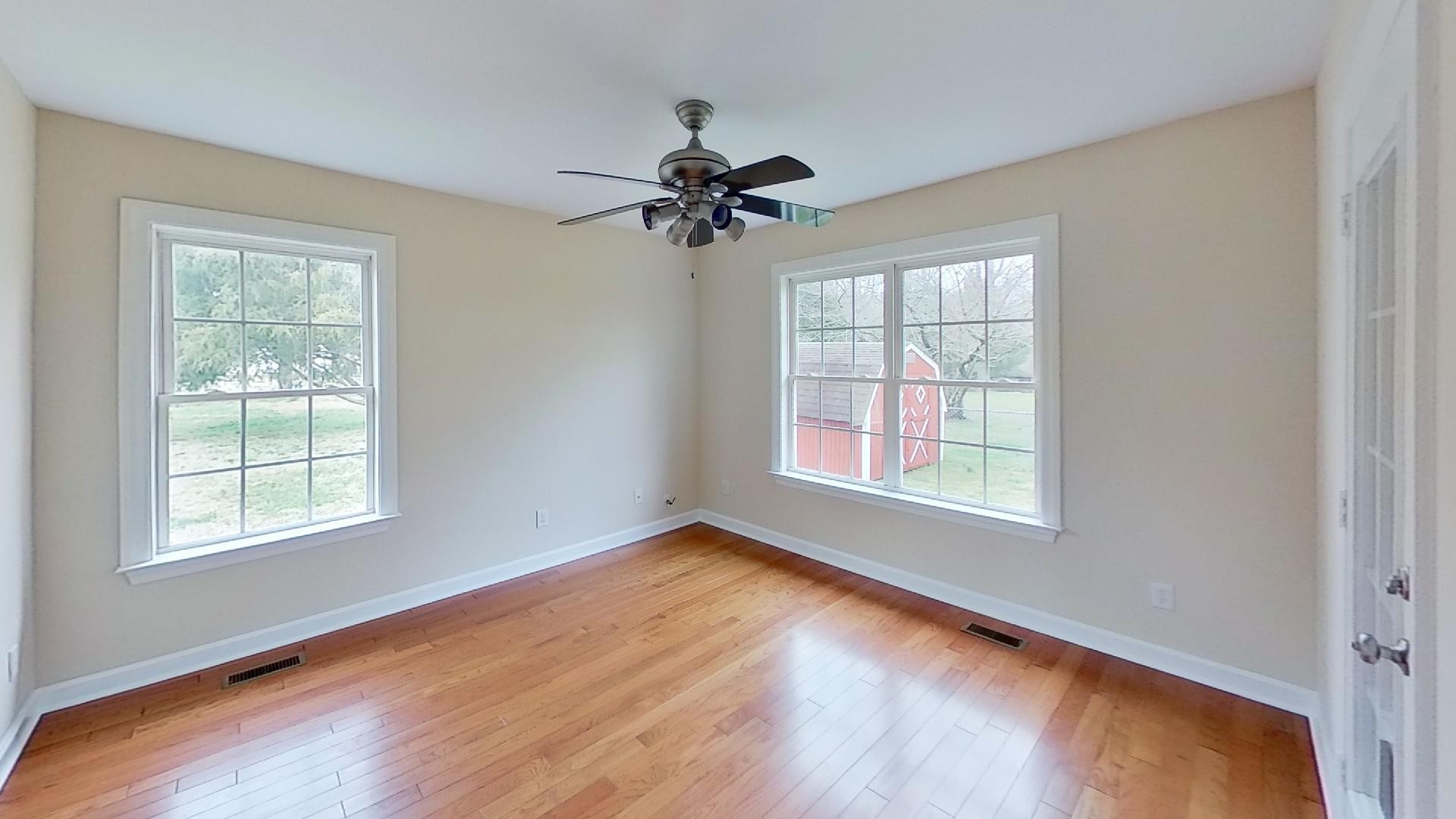 2136 Clara Mathis Road Spring Hill, TN 37174 - Photo 20 of 23 an empty room with windows and fan