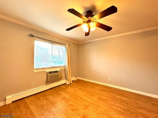 en view of an empty room with a window