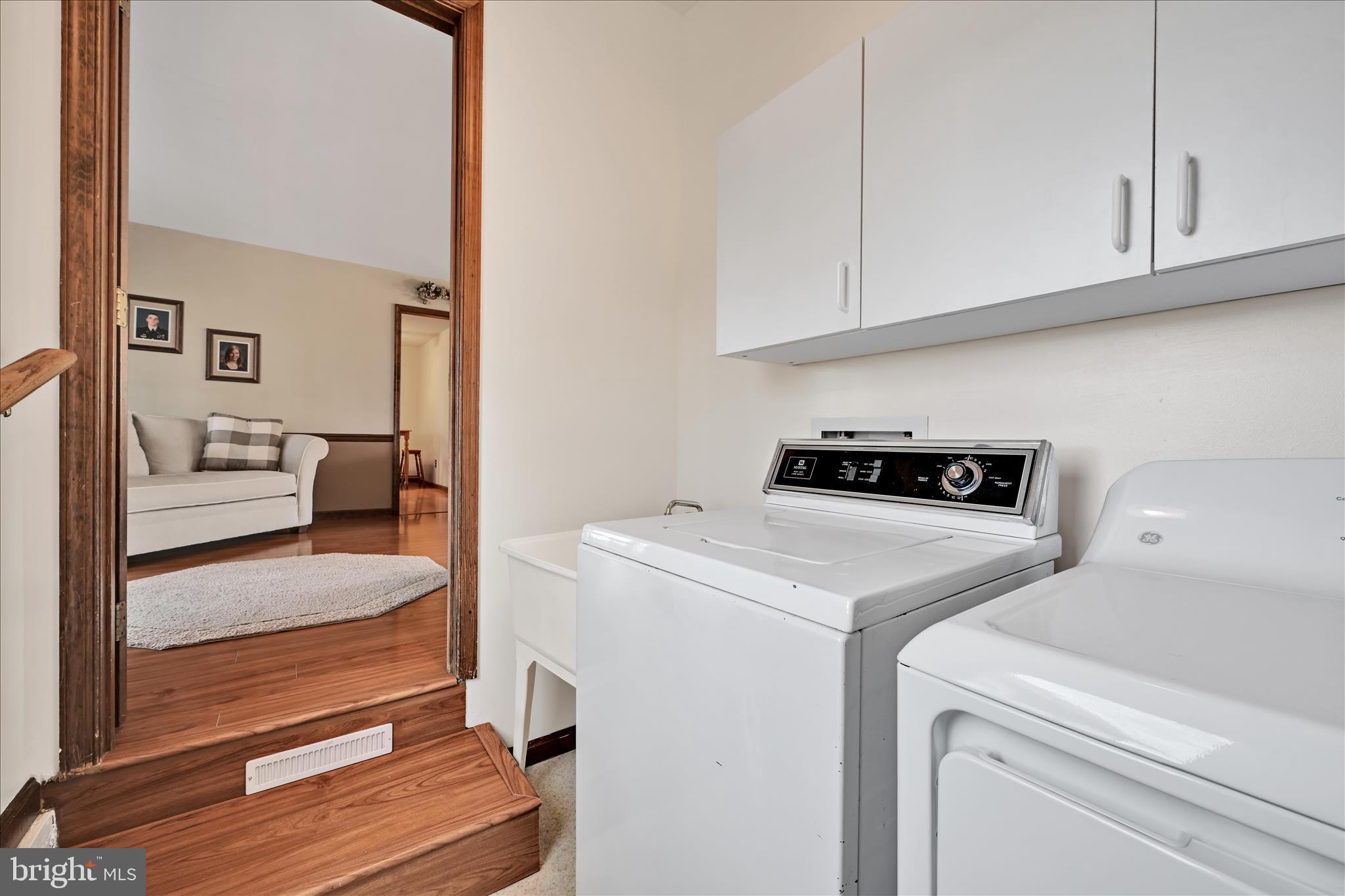 921 Acri Road Mechanicsburg, PA 17050 - Photo 14 of 46 a view of hallway with washer and dryer