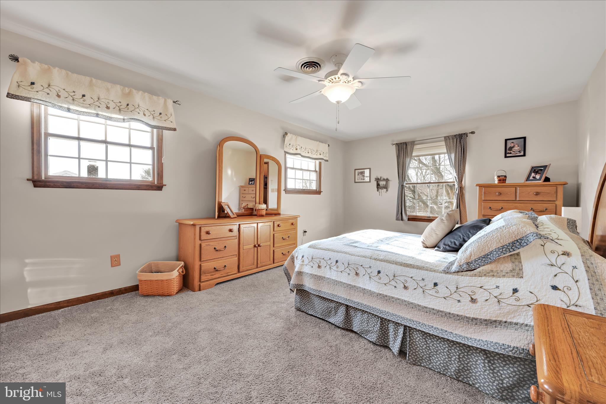 921 Acri Road Mechanicsburg, PA 17050 - Photo 15 of 46 a bedroom with a bed and window