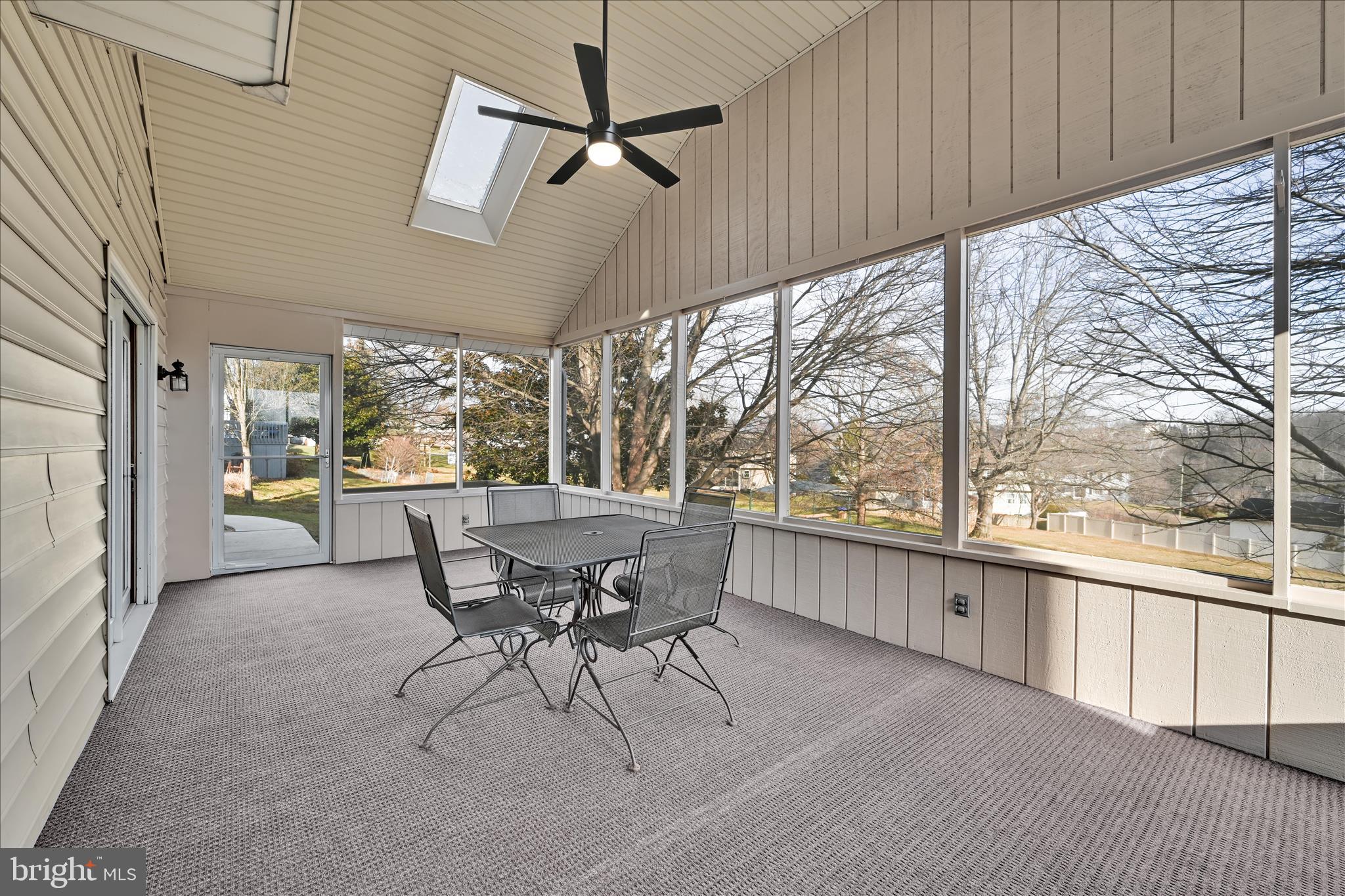 921 Acri Road Mechanicsburg, PA 17050 - Photo 31 of 46 a view of a patio with a table chairs and a porch