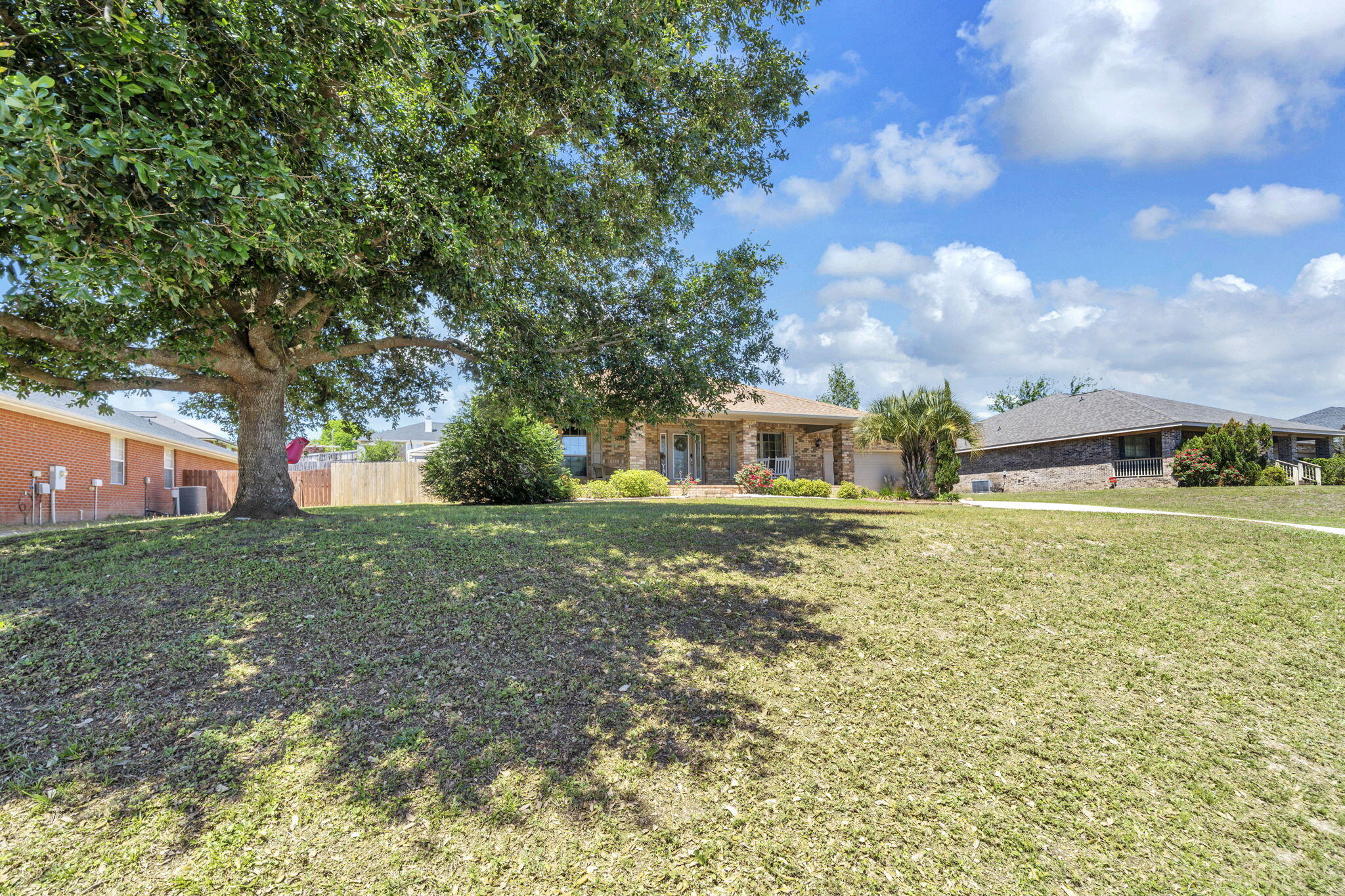 217 Raptor Drive Crestview, FL 32536 - Photo 1 of 48 a front view of house with yard and trees