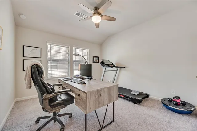 a workspace with chandelier