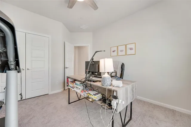 a view of a workspace with furniture