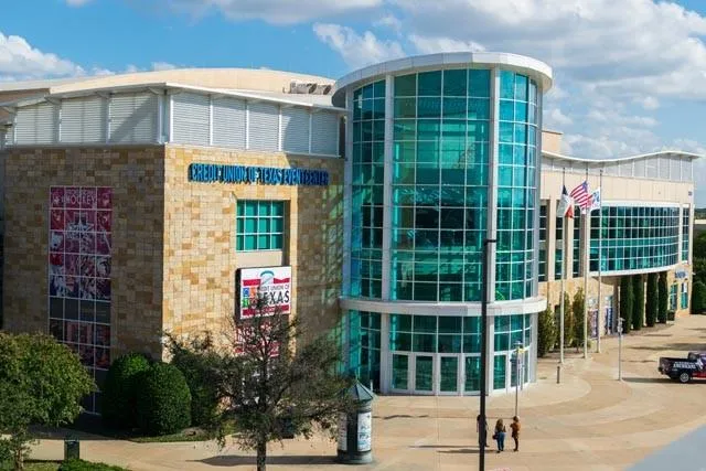 a view of a building with a street