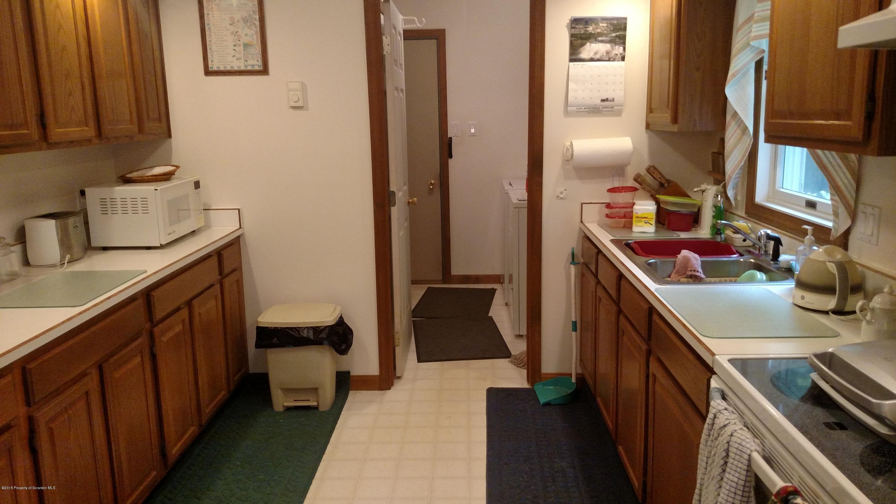 234 Hilltop Road Newfoundland, PA 18445 - Photo 4 of 21 a bathroom with a sink and a mirror