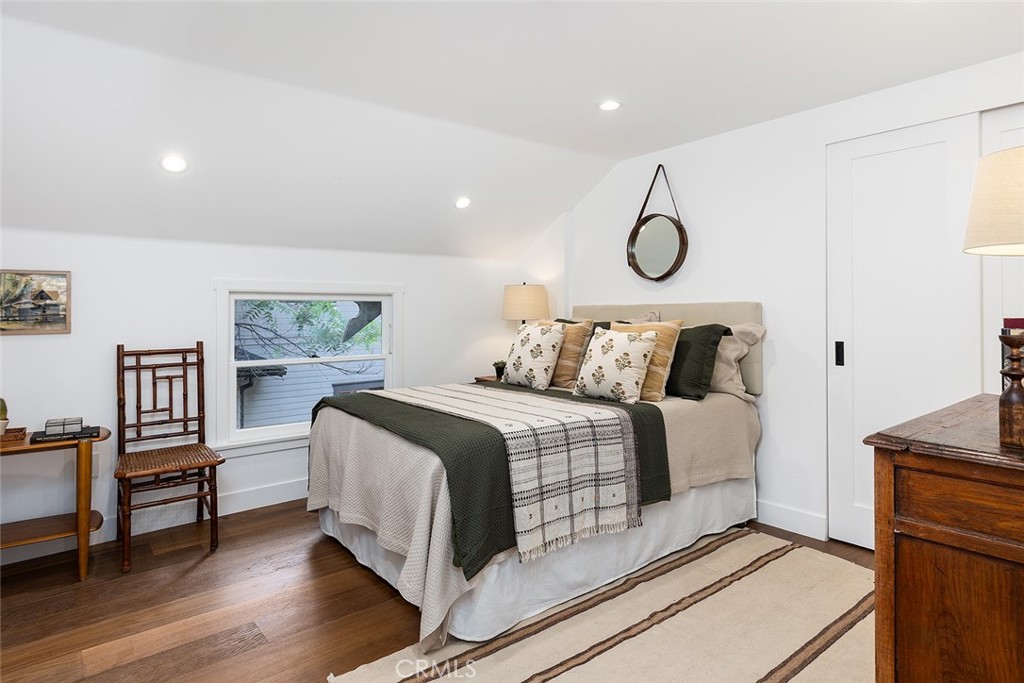 1130 Windsor Place South Pasadena, CA 91030 - Photo 25 of 35 a bedroom with a bed and wooden floor