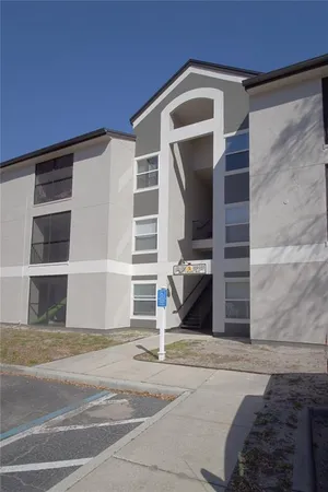 a view of backyard with garage