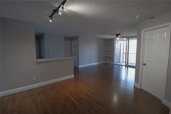 a kitchen with a sink a counter top space and a window