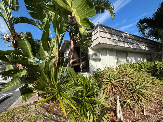 a view of a livingroom with wooden floor