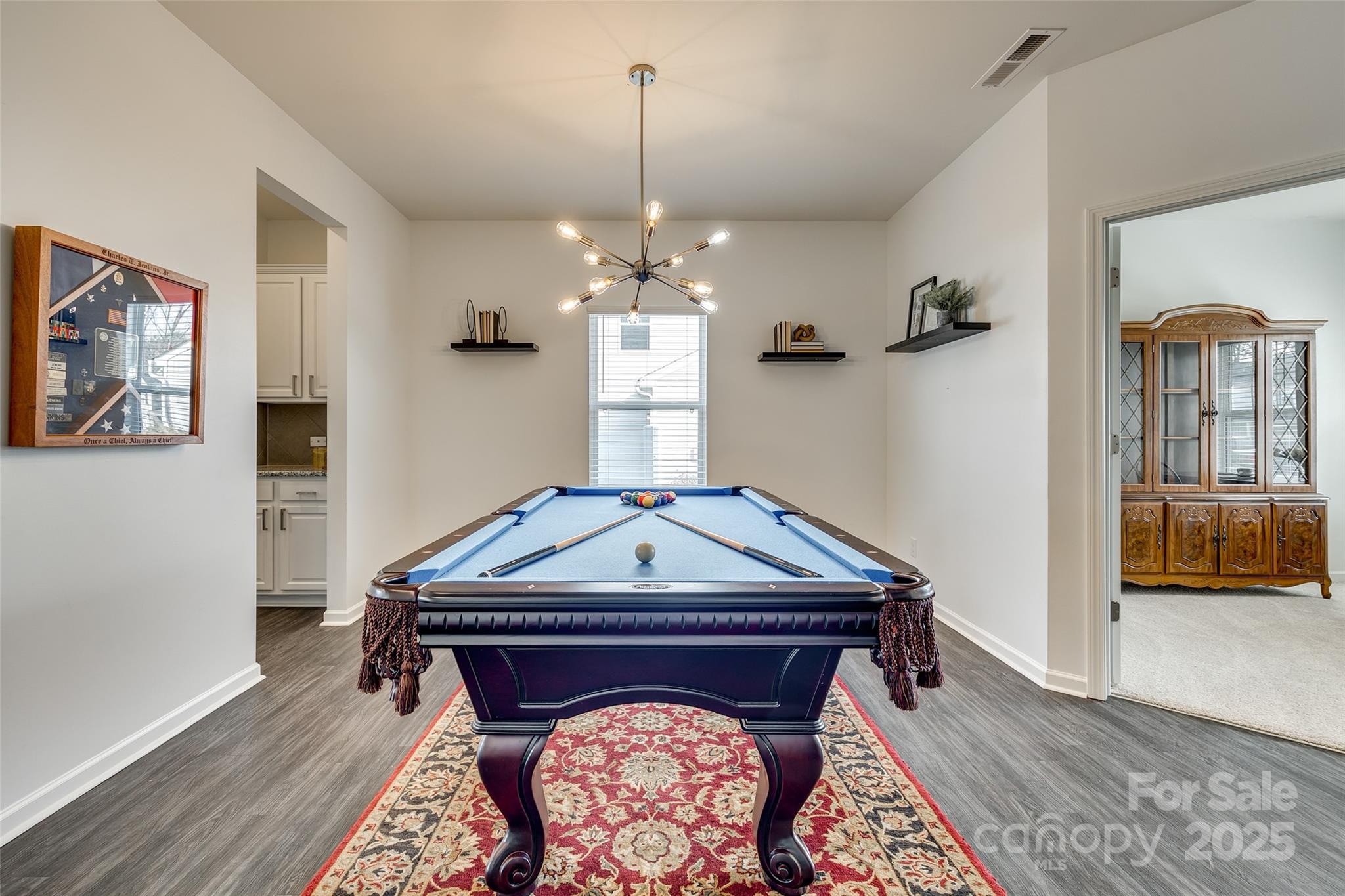 634 Gants Road York, SC 29745 - Photo 11 of 42 a room with wooden floor and furniture