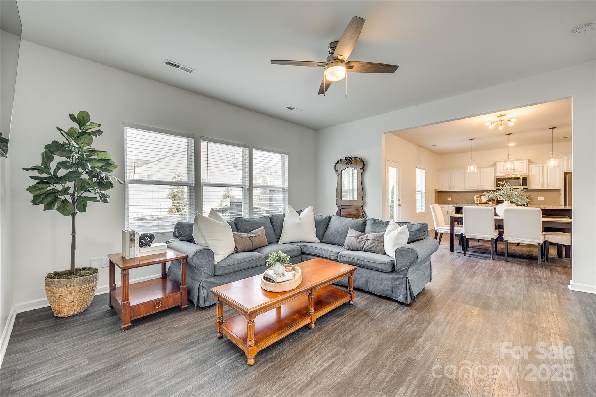 634 Gants Road York, SC 29745 - Photo 18 of 42 a living room with furniture fireplace and chandelier
