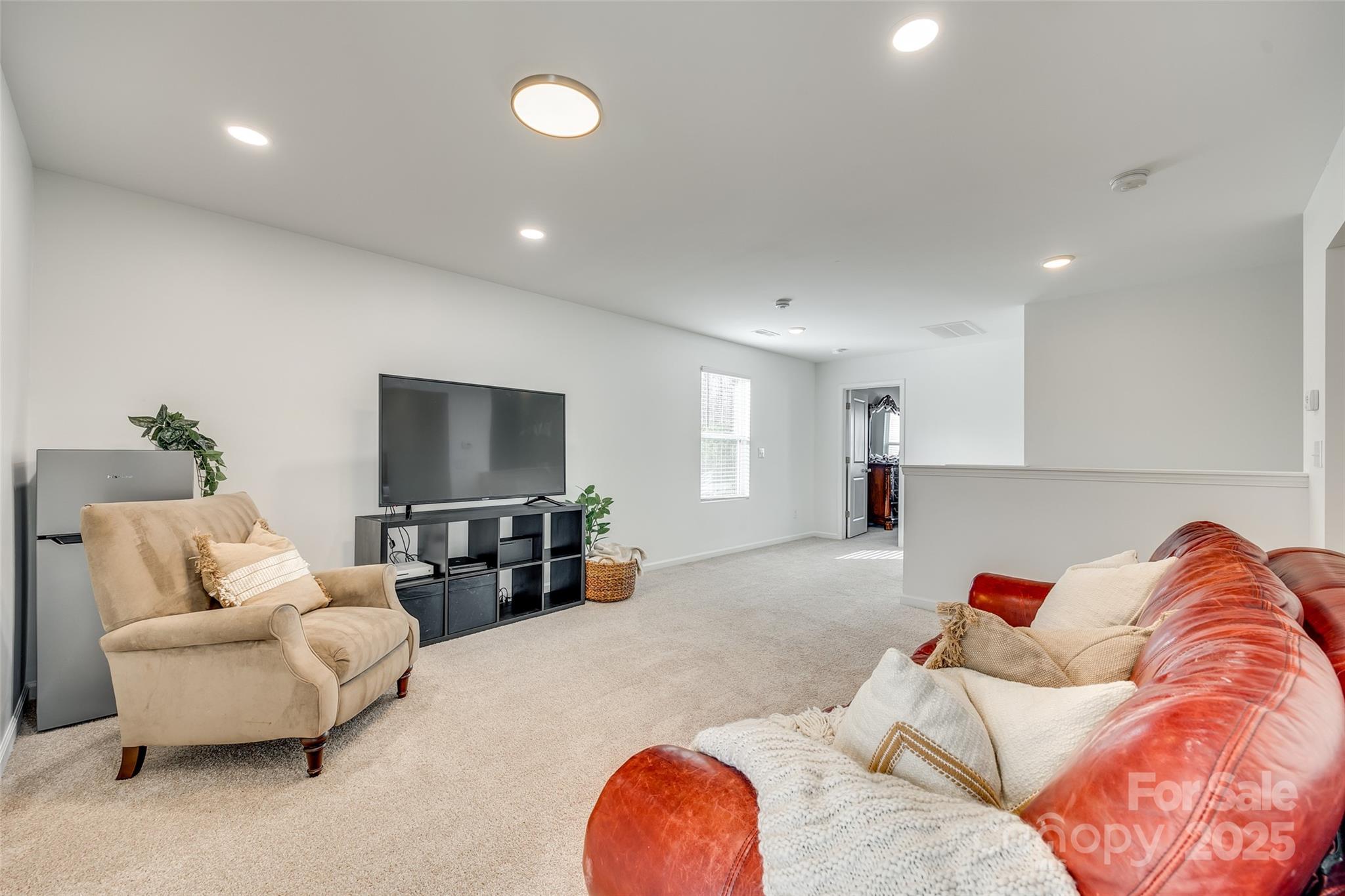 634 Gants Road York, SC 29745 - Photo 25 of 42 a living room with furniture and a flat screen tv