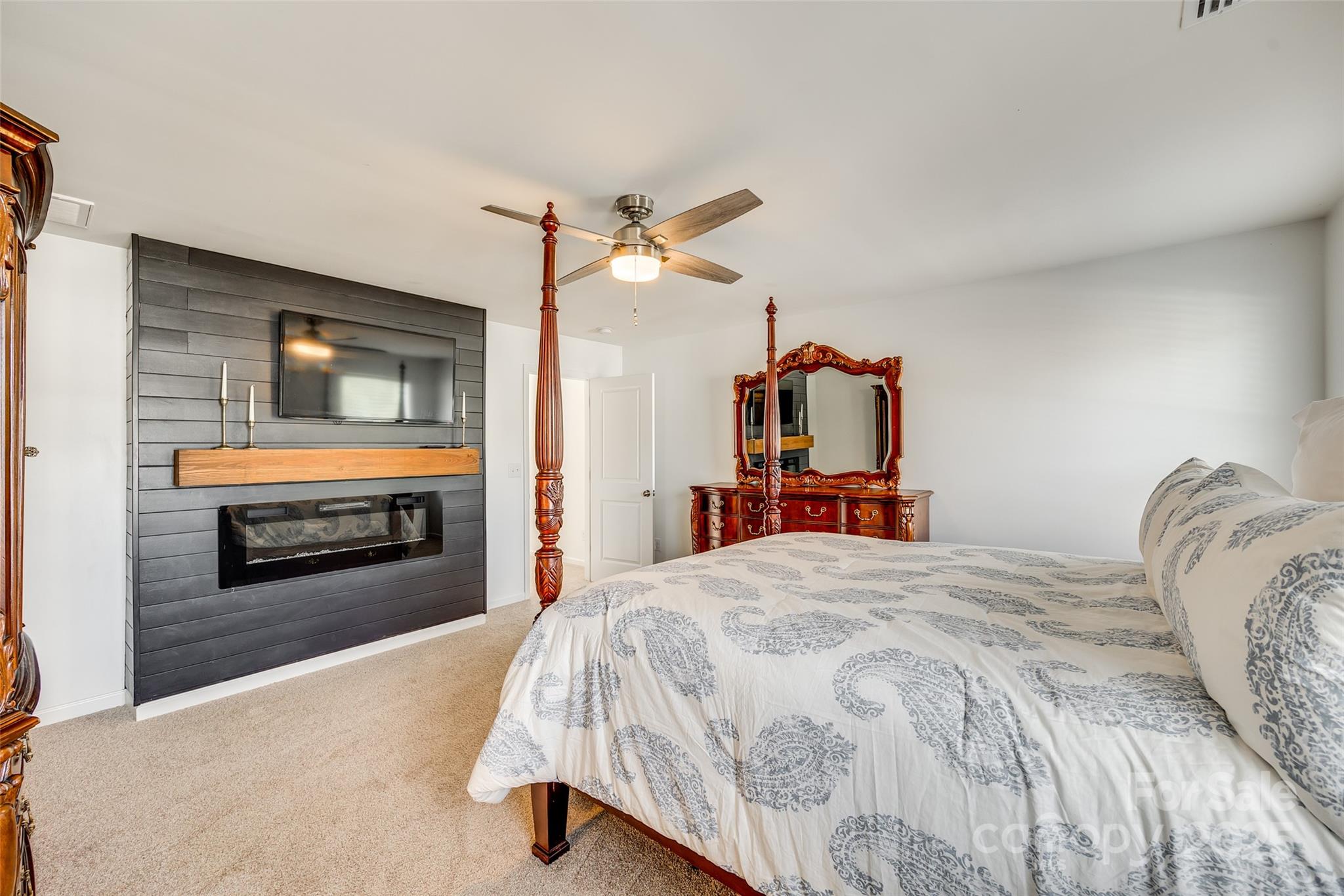 634 Gants Road York, SC 29745 - Photo 29 of 42 a bedroom with a bed and a flat screen tv