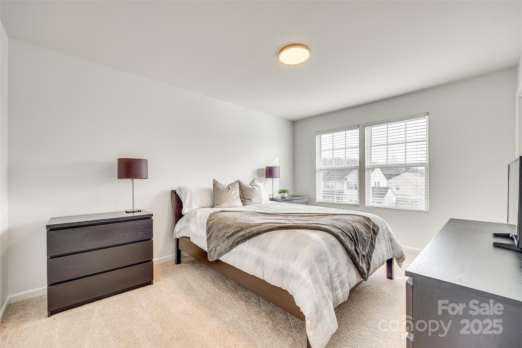 634 Gants Road York, SC 29745 - Photo 31 of 42 a bed room with a bed and a desk