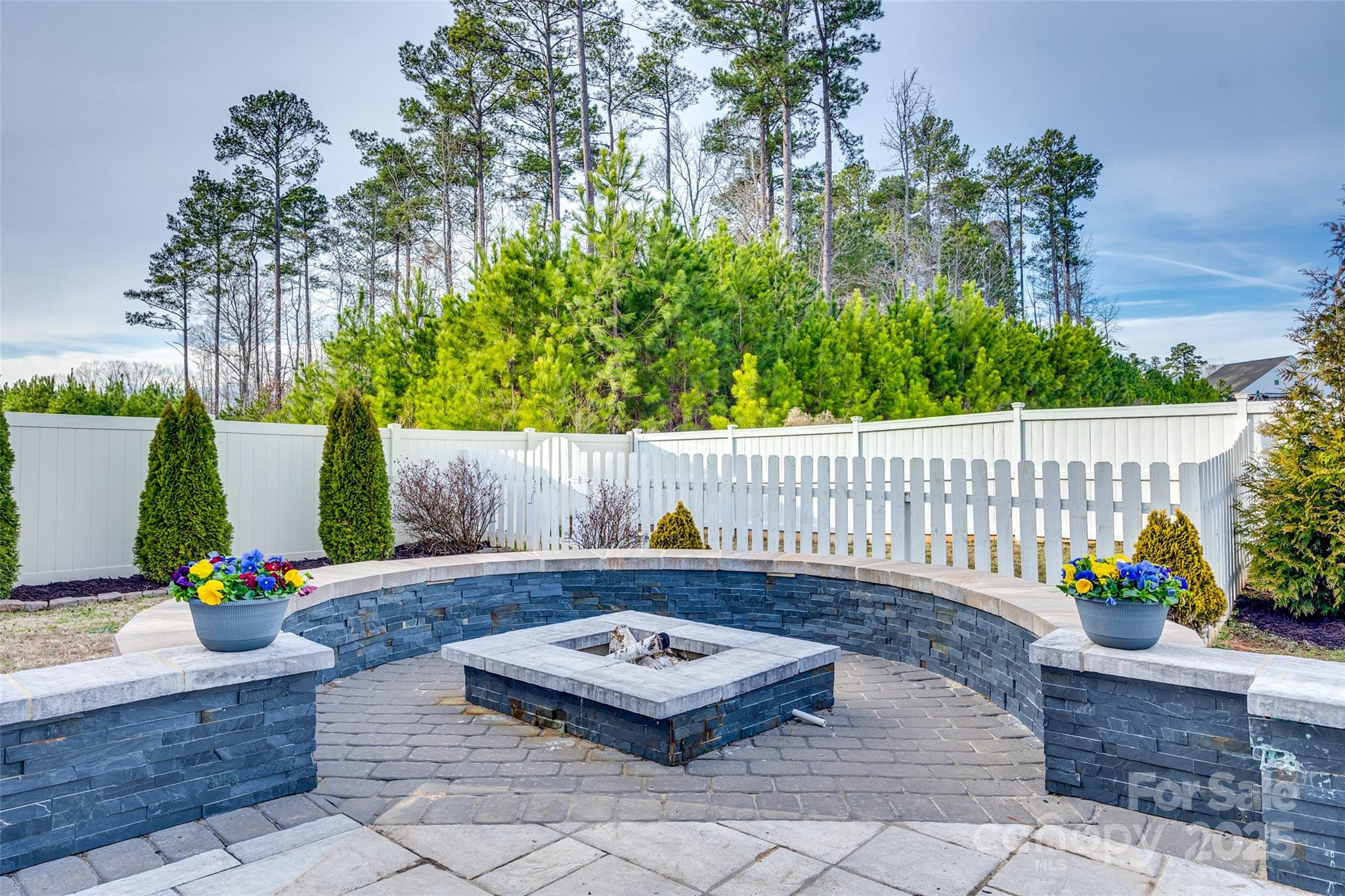 634 Gants Road York, SC 29745 - Photo 37 of 42 a wooden bench sitting in front of a building